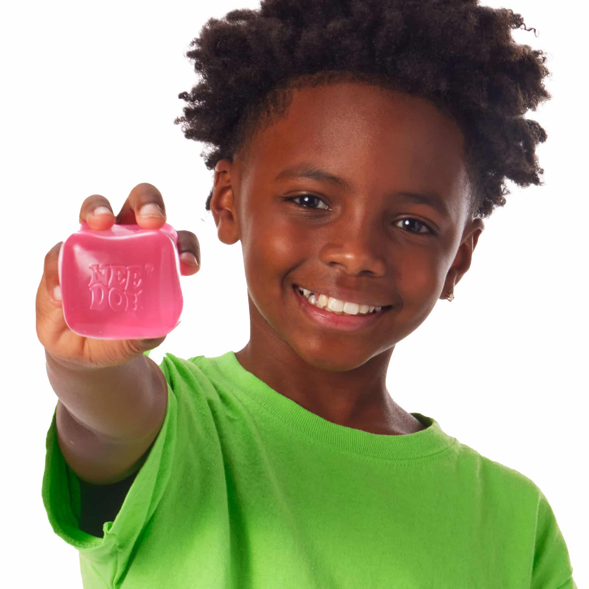 NeeDoh Nice Cube Lifestyle of boy squeezing pink Nice Cube